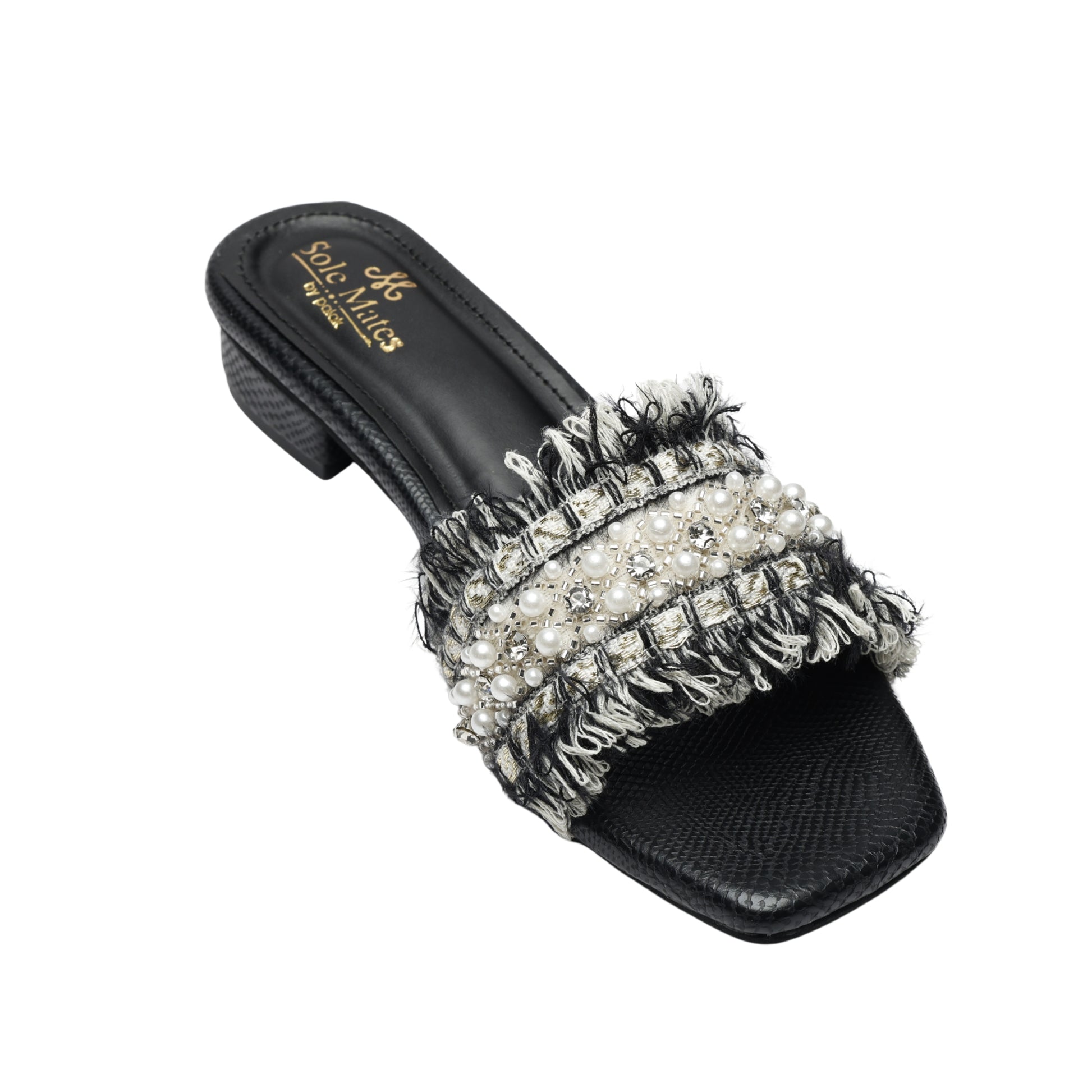 Angled top view of Boho Chic Black slider by Solemates by Palak — black and cream tweed fringe strap with mixed-size pearls, silver crystals and seed bead embellishment