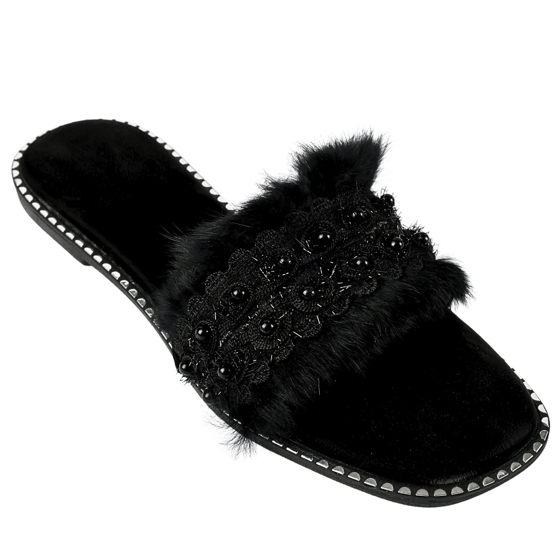 Angled view of Furry Black slider by Solemates by Palak — black fur-textured strap with floral lace and bead embellishment, silver stud sole trim and black suede-finish base, white background