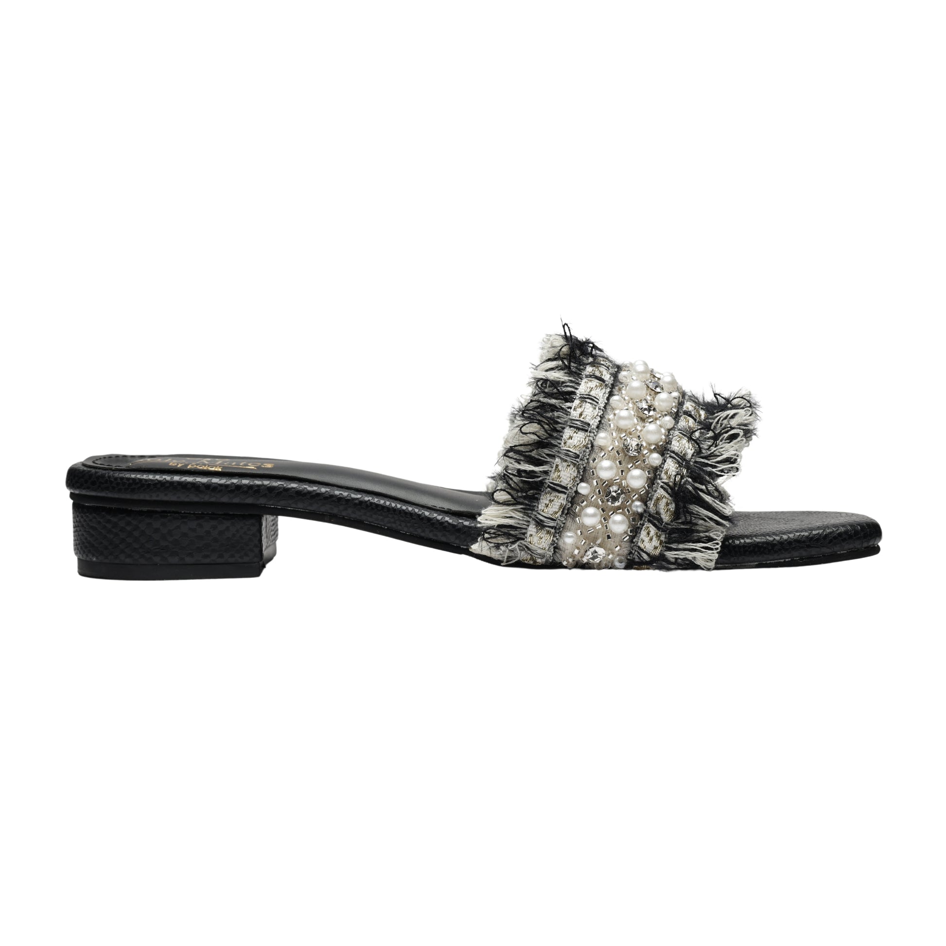 Side profile of Boho Chic Black slider by Solemates by Palak — black croc-embossed base with low block heel and tweed fringe pearl-embellished strap, white background