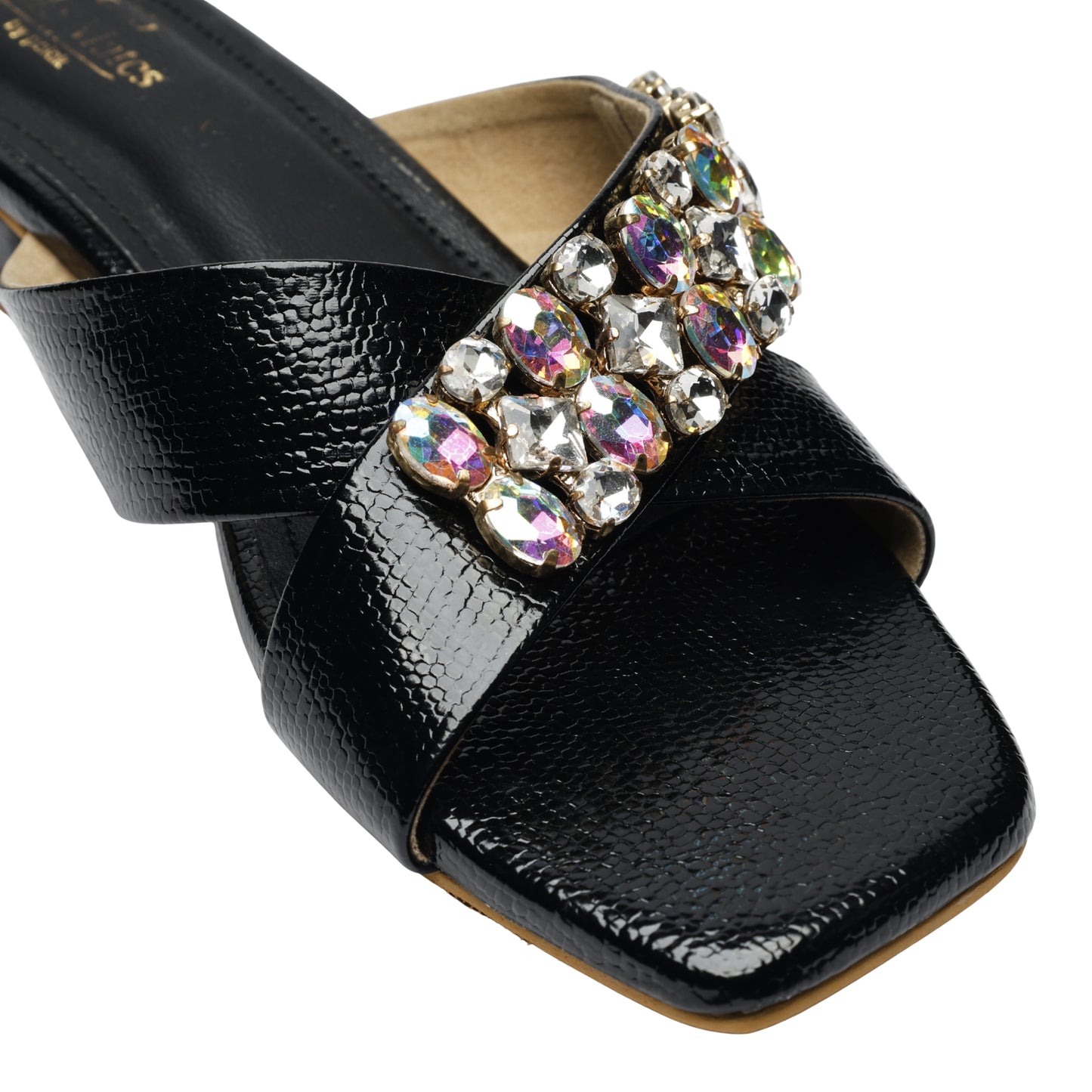 Charolette Black Sliders crystal close-up — oversized iridescent AB crystals and clear rhinestones in oval and teardrop cuts on black textured patent strap by Solemates by Palak