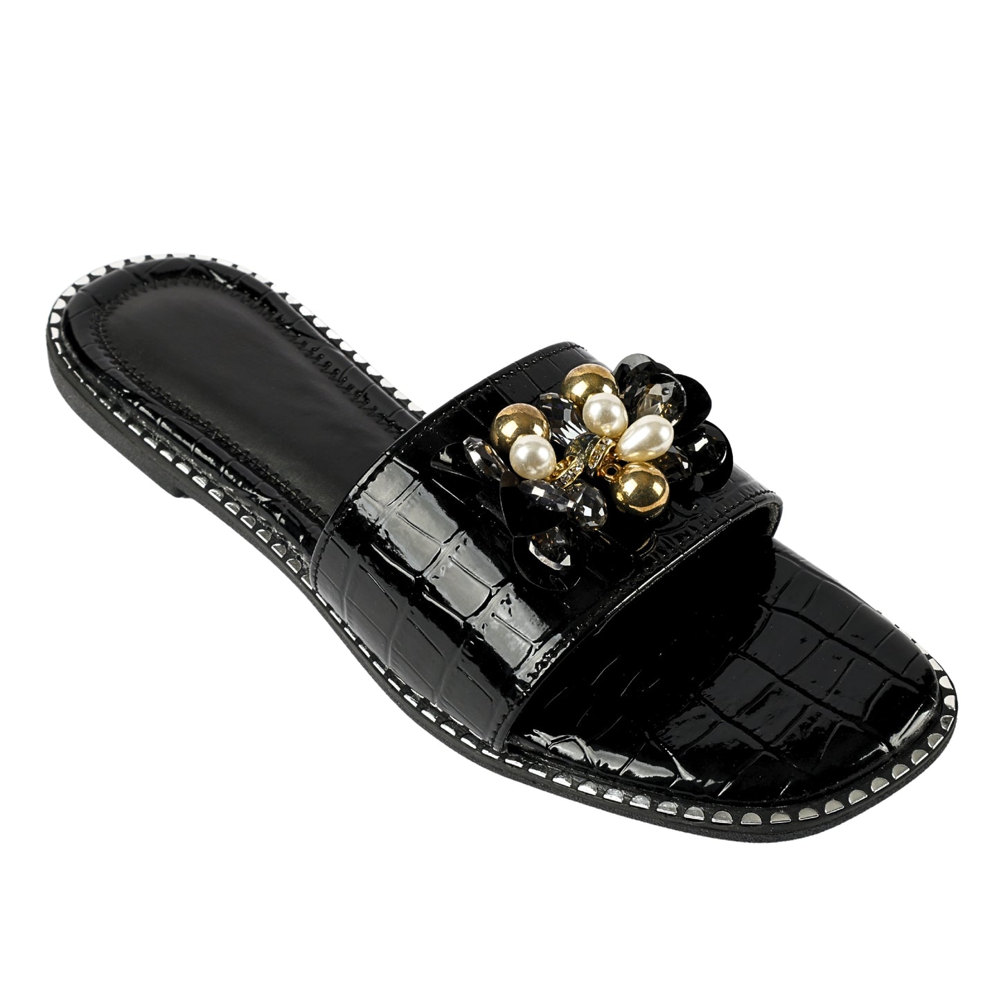 Topaz Black Flat Sliders angled top view white background — black patent croc-embossed flat sliders with pearl, gold bead and crystal floral brooch and silver studded sole trim by Solemates by Palak