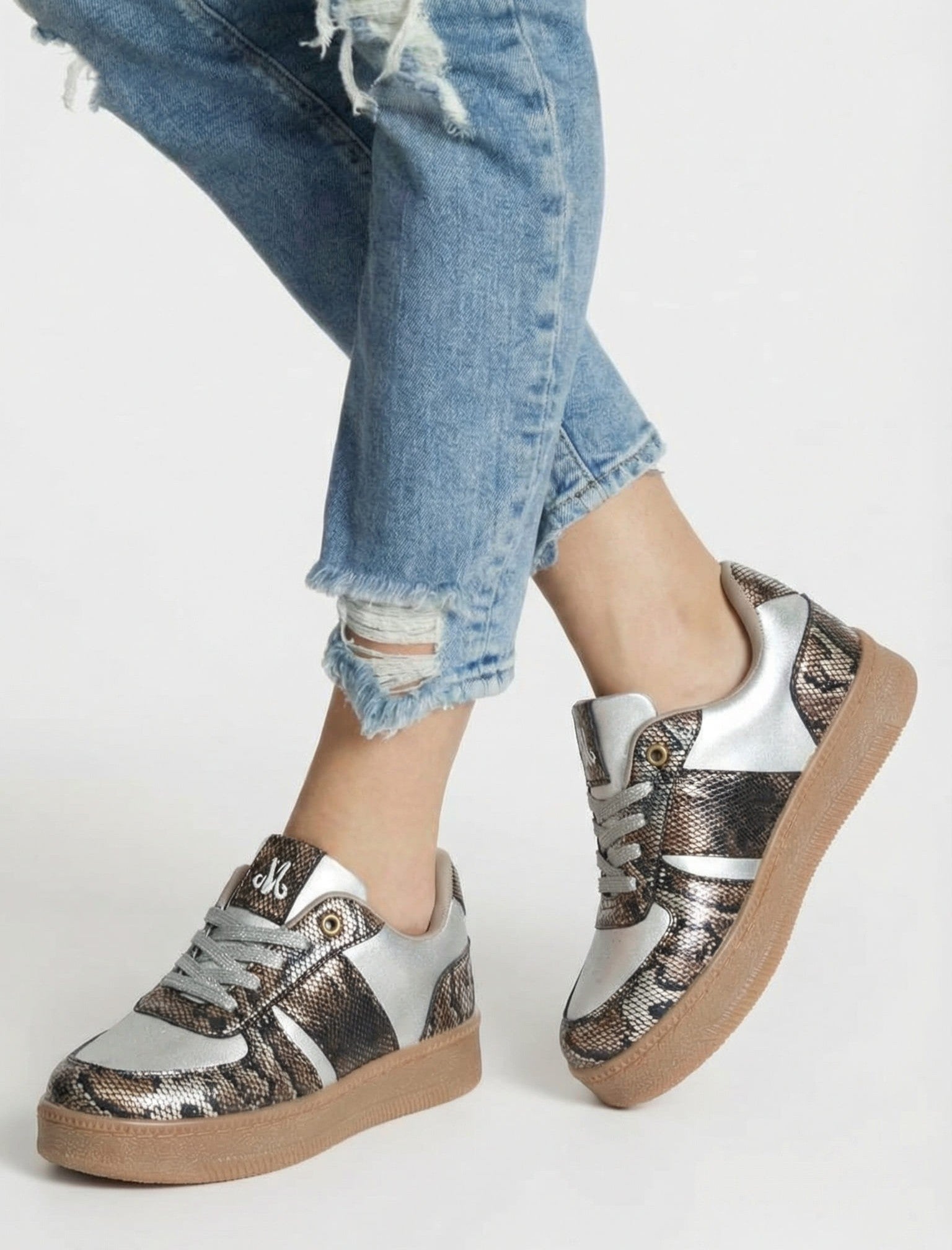 Luxe Python snake print and silver sneakers worn with ripped denim jeans — Solemates by Palak