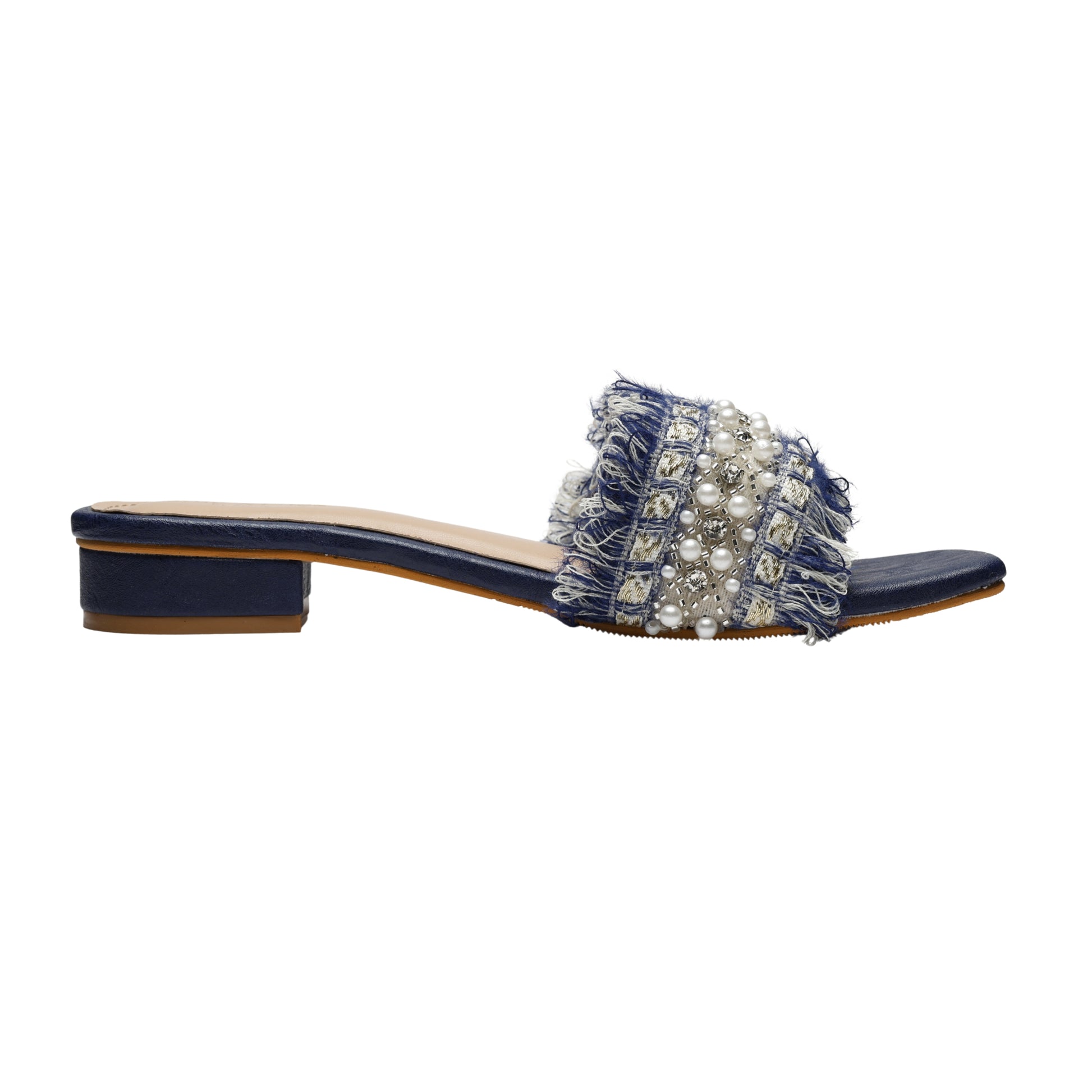 Side profile of Boho Chic Blue slider by Solemates by Palak — navy blue base with low block heel, tweed fringe pearl-embellished strap and tan rubber sole, white background