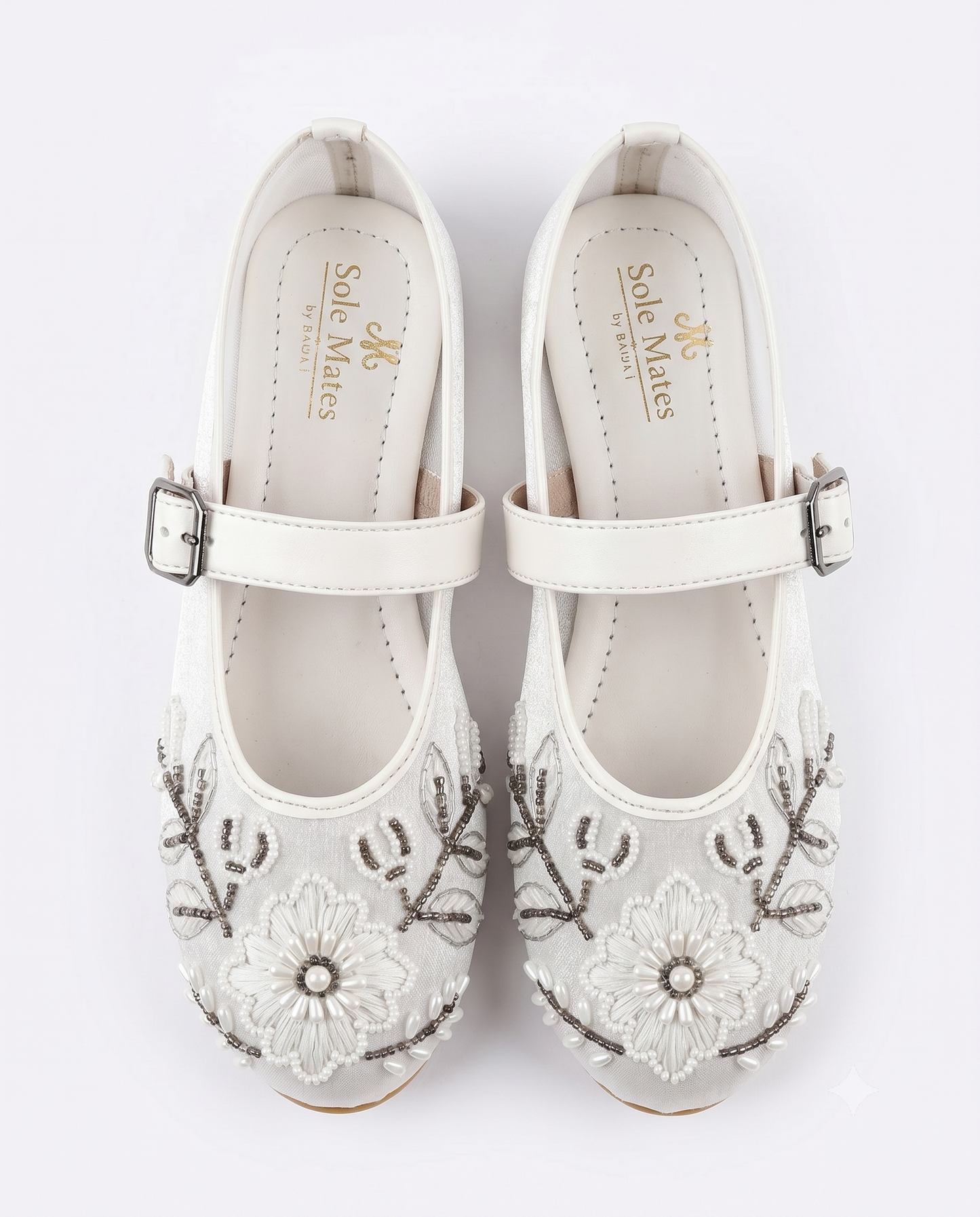 The Ballet Bloom Mary Janes top view pair — ivory shimmer Mary Jane ballerinas with hand-embellished pearl and bead floral work by Solemates by Palak