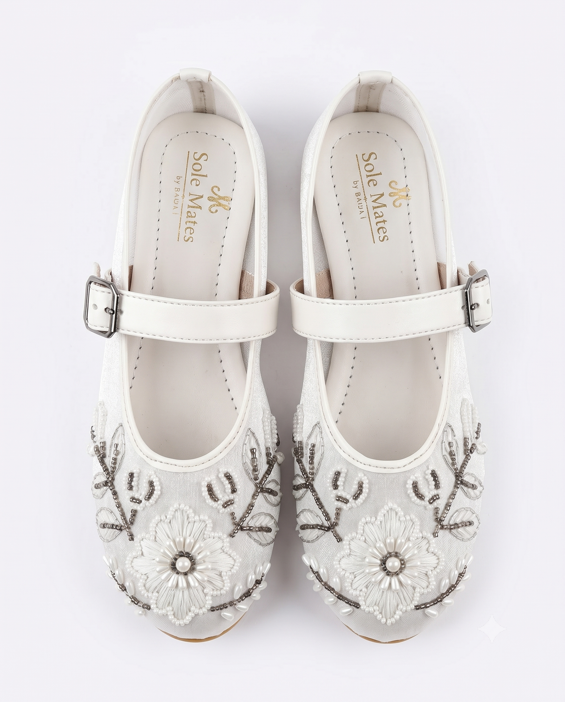 The Ballet Bloom Mary Janes top view pair — ivory shimmer Mary Jane ballerinas with hand-embellished pearl and bead floral work by Solemates by Palak