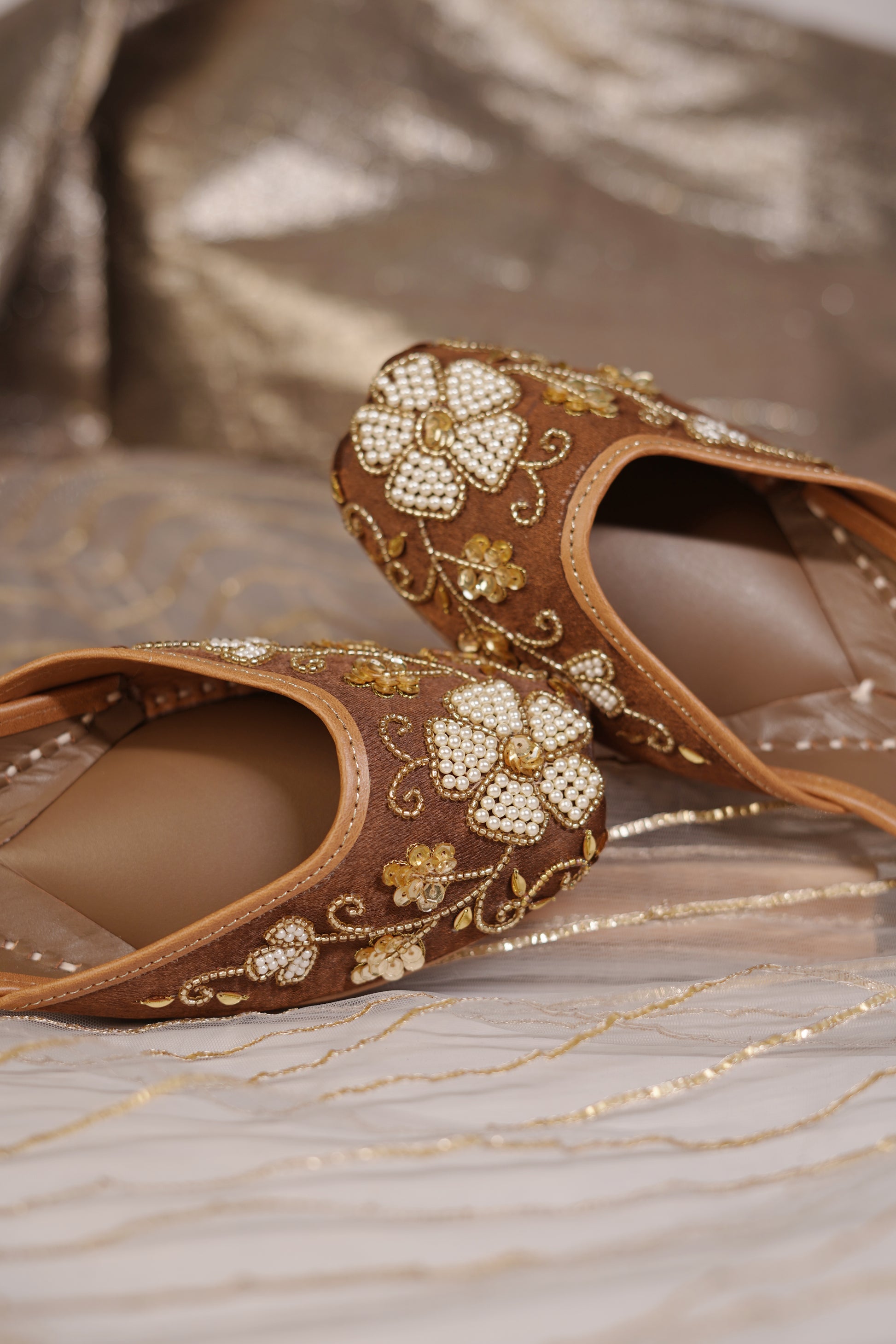 Mocha Pearl and Gold Embellished Juttis close-up — pearl flower clusters with gold zardozi vine work by Solemates by Palak