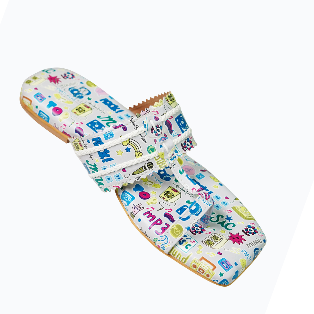 Melophile Kolhapuri Flats angled side view — white music themed doodle print flat with scalloped strap edge and rope cord detail by Solemates by Palak