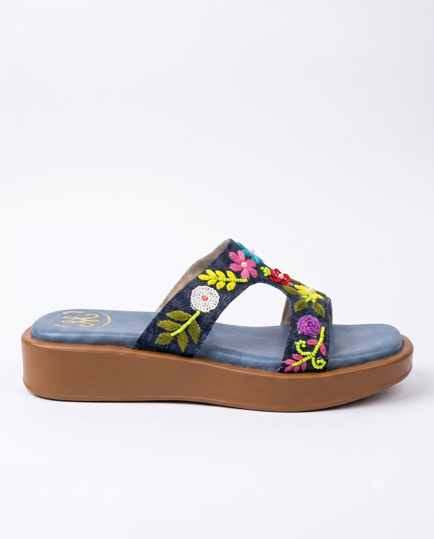 Sydney Blue Sliders side profile white background — dark denim hand embroidered H-strap flatform sliders with blue insole and tan sole by Solemates by Palak